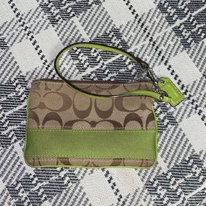 Vintage green coach coin purse.